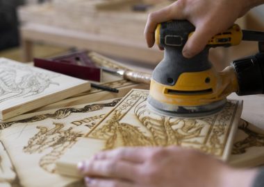 young-man-working-wood-engraving-workshop-1024x683